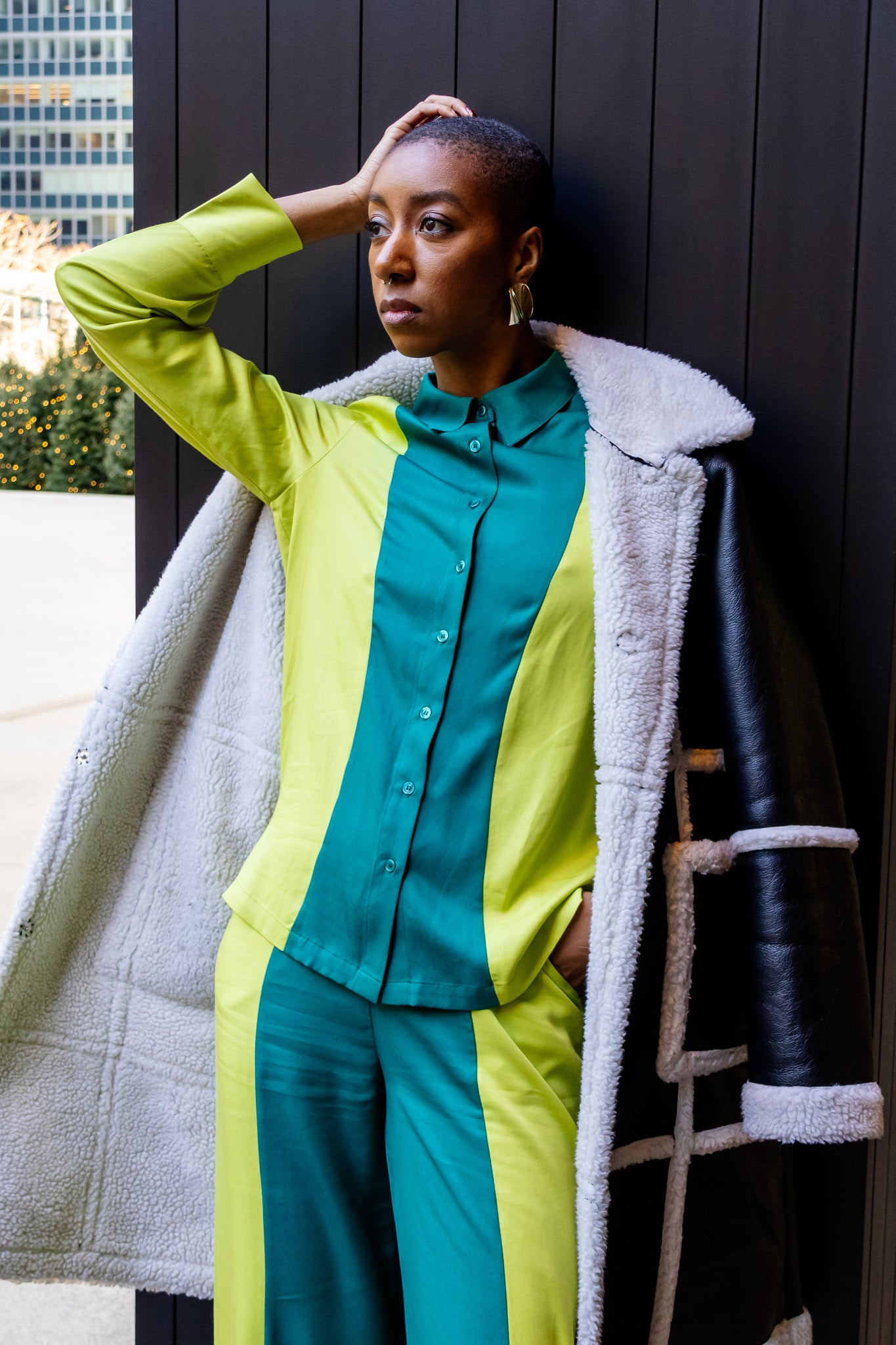Briy, 6'2", wears the Robyn Bandele London color block long sleeve shirt made for tall women.