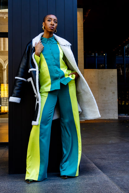 Briy, 6'2", wears the Robyn Bandele London set with color blocked shirt and wide leg pants made for tall women.