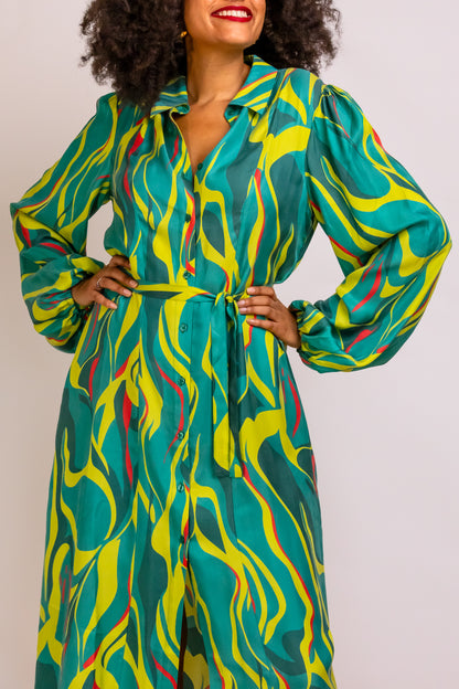 Detail view of Denver Abstract Printed Midi-length Shirt Dress featuring collar, working button placket, and voluminous sleeves with elasticated wrist.